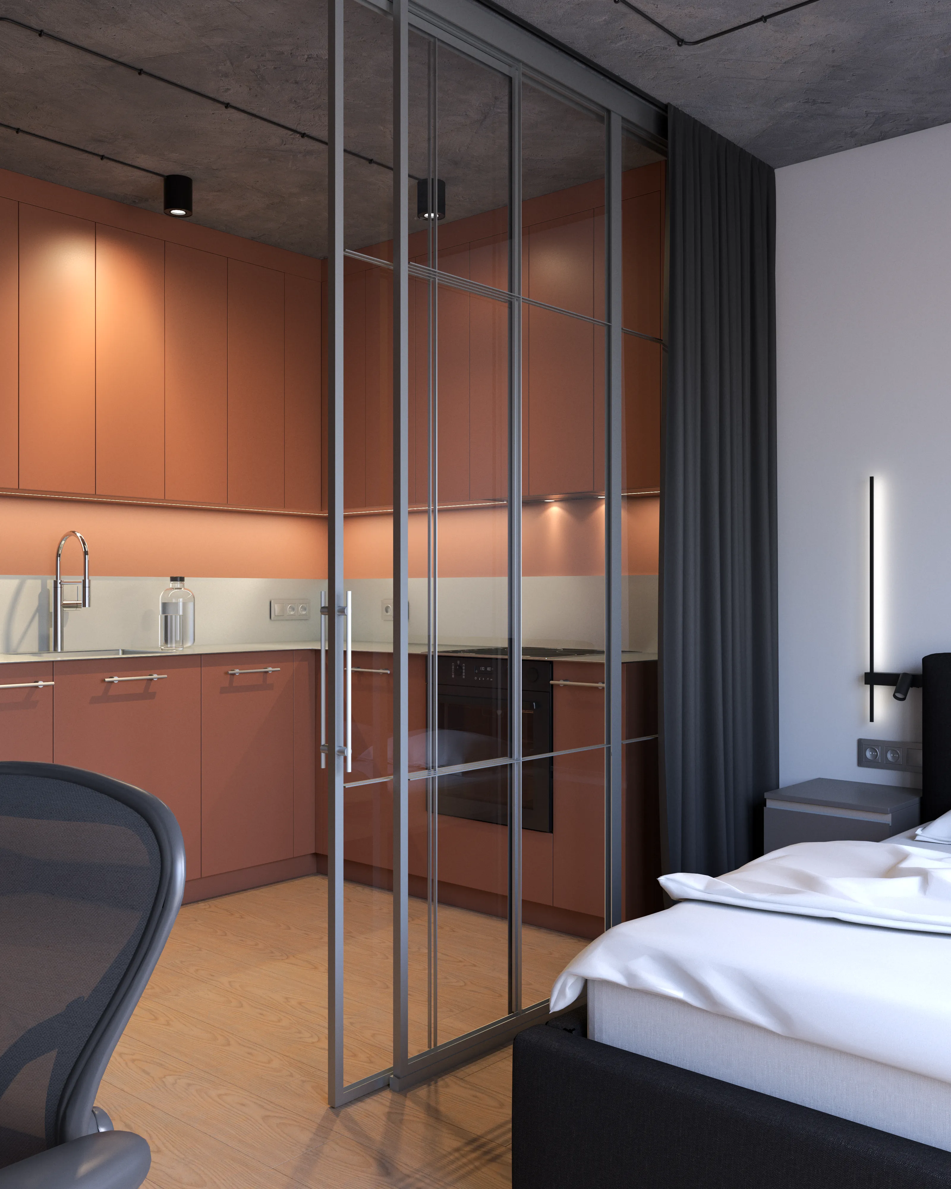 Szklana ścianka działowa w stalowej ramie oddziela kuchnię od sypialni – ciemna zasłona, terrakotowe meble, projekt małej kawalerki w Warszawie.